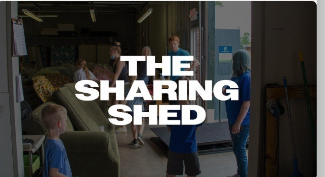 Volunteers sorting donated furniture and goods at The Sharing Shed